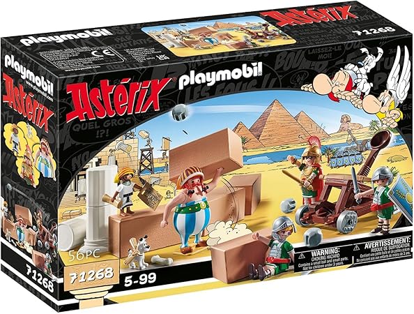 Coffret Playmobil Astérix 71268 montrant des personnages de bande dessinée construisant un mur avec des pyramides égyptiennes et des soldats romains en arrière-plan.